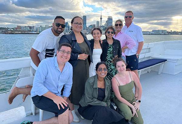 The Grow NZ Business team poses for a photo while on a boat.