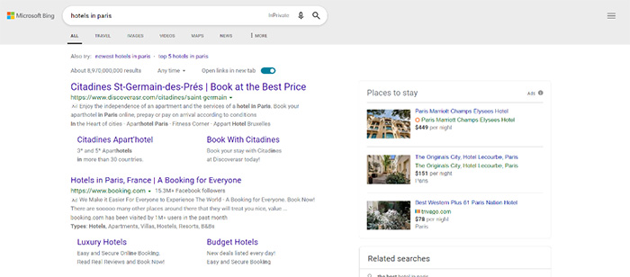 A Bing search about where to say in Paris with Hotel Prices Ads on the left and a pop-up column on the right with Microsoft Bing Images with more hotels.