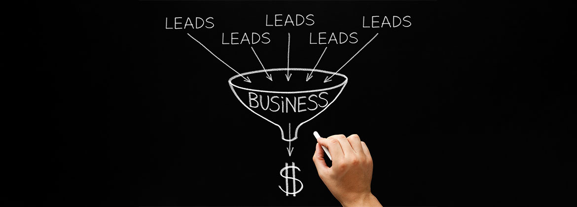 On a blackboard, a hand draws a funnel representing business and leads coming into the funnel.