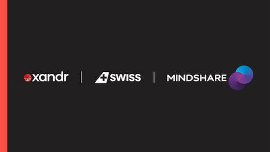 The Xandr, Swiss Airlines, and Mindshare logos over a black background.